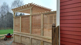 Wood pergola with lattice privacy screen