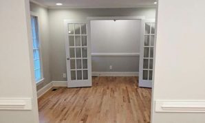 Room with French doors and hardwood floors